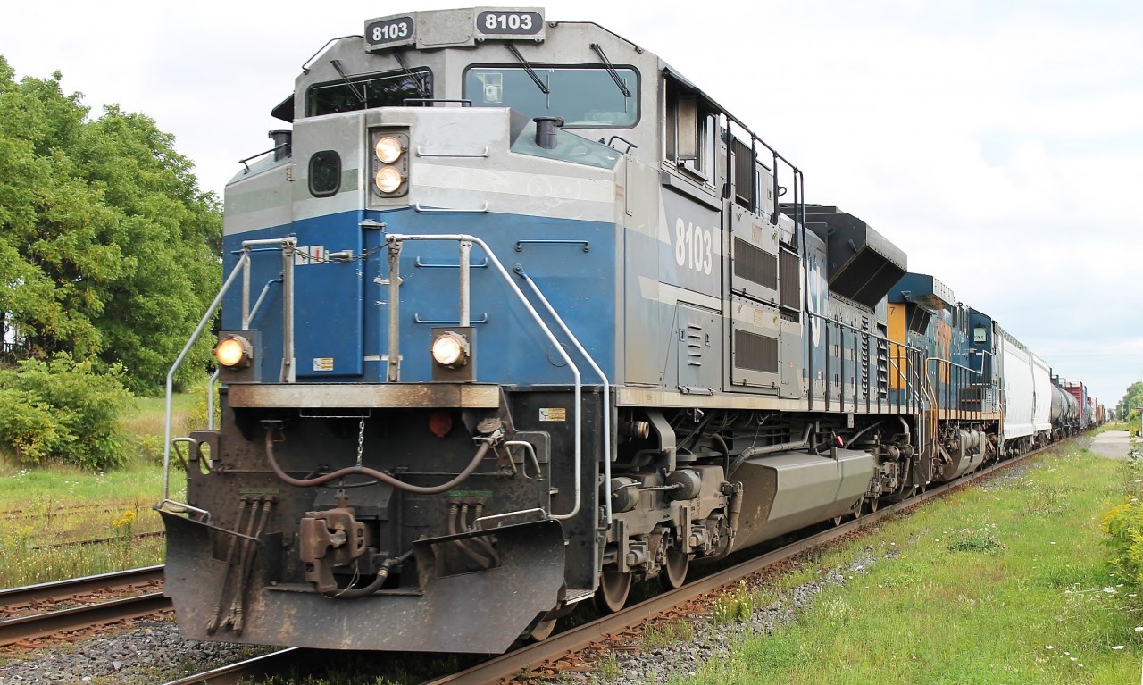13:12 and this westbound ran through the station with CN8103 and CSX5117 for power. Having spent a few days recently following CSX power in Buffalo, it was only apt that my return to Canadian rails should have this as a second loco.