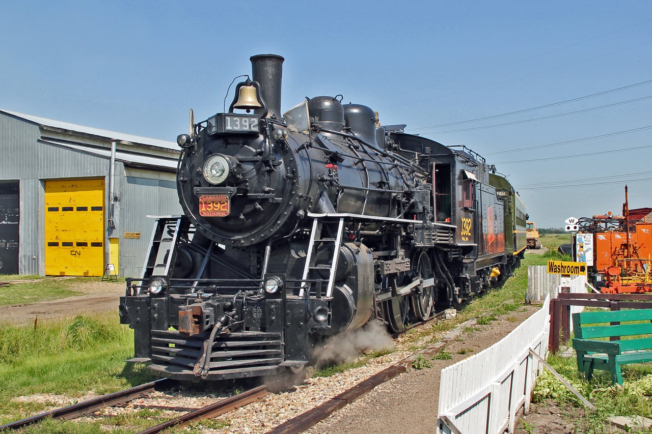 MLW 4-6-0 CN 1392 rests at the end of the station waiting for its next journey.
