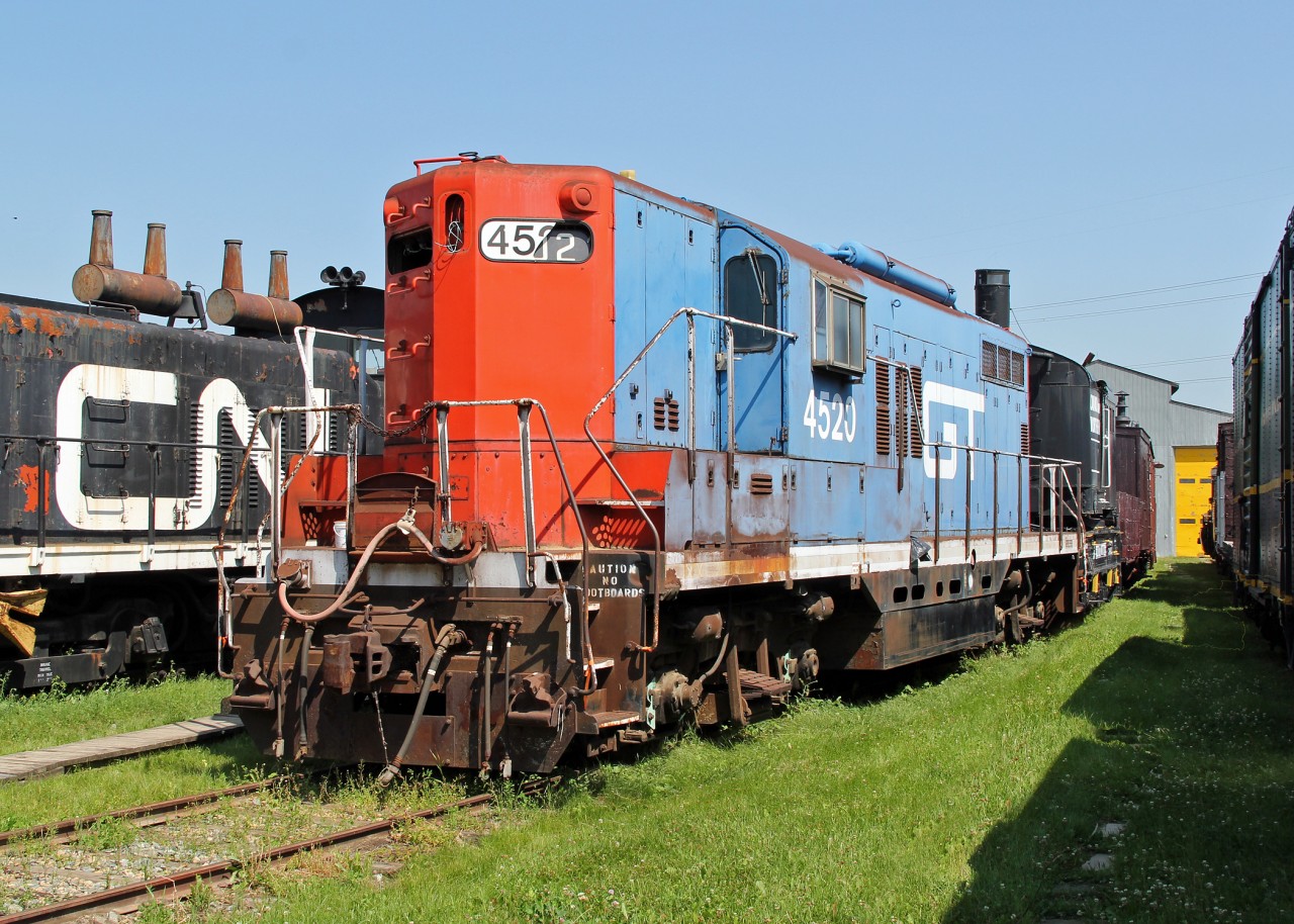 GT 4520 was the last CN GP-9 left with the high short hood.  It has roof mounted air reservoirs which on passenger Geeps had to be relocated because a water tank was added under the frame for a steam generator.
It was brought to Edmonton complete and in running condition. Over the years, the number boards, horn, headlights and bell have been stolen off the locomotive. Before being donated to the museum it could be seen in the dead line at Walker Yard.