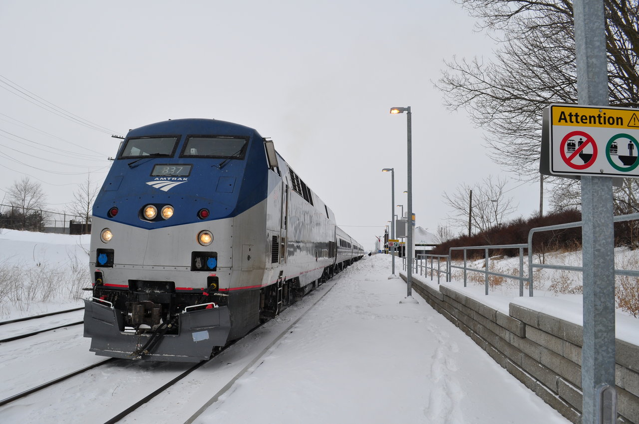 With all the warm weather we've had, here's a cold shot. I thought my fingers were going to fall off while taking this. In this winter scene, AmTrak 837 is preparing to leave the St.Catharines station, on it's way to Niagara Falls.
