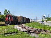 Trillium 110 is heading back to Merritton with a few cars after servicing some industries. Infront of my lies a diamond. The track that is closest to TR 110 is the Lakeshore Spur, which most of the trackage was removed in 2006-ish, and the other track I believe is now abandon.