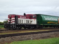 64 year old GE 70 Tonner, former Modesto and Empire Traction Co 604, shows no sign of slowing down in Chamberlain, SK. Built in Jan, 1950, and retired by M and ET in 2009, she replaced the Trackmobile that had been stationed here since the transload operation began. 604, and 3 sister units arrived on the LMRR in 2012 and sat for a year before being assigned work. 604 is pulling a string of empties back under the loading chute after pushing 3 loads onto the main for pick up by MGLX 3138. 