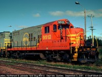 One of the 2 QNSL yard slugs sits in the yard in Sept Isle on a beautiful, sunny September morning in 2001.