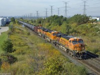 Shot at Weston Rd on the Halton, CN U710 chugs uphill with three pumpkins leading thousands of tonnes of fresh American crude for the east coast. It's pumpkin season, Charlie Brown!