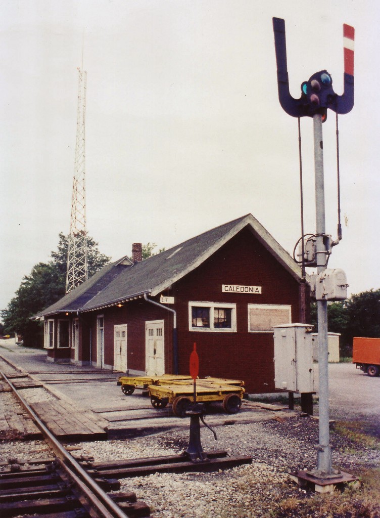 Here's a glimpse of the old CN station at Caledonia, as of today, still standing. Small town stations are few and far between these days. This one was fortunate to escape the wrecker's ball; as CN looked for permission to pull it down in 1978, one year after the signal and pole was removed, in turn a year after this photo was taken. This is Southern Ontario Railway territory now.