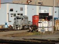 NREX 5665 (nee CP 5665) basks in evening sun outside the HCRY/DESX shops, beside former CN SD40-2W's 5313 and 5311. DESX 5311 is now painted up for a new owner in Alberta, while DESX 5313 faces an uncertain future.  