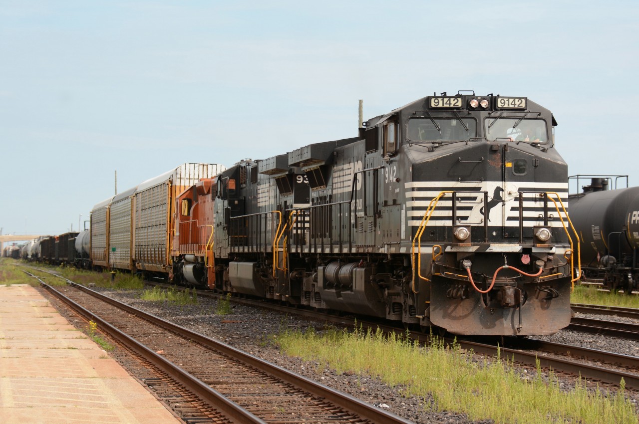 NS9142 with NS9316 and Elgin Joliet and Eastern unit 675 head toward the St. Clair River tunnel.