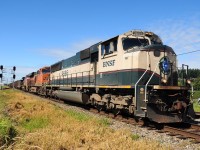 BNSF SD70MAC 9666, BNSF ES44C4 6793, and BNSF C40-8W 910 leading a coal train east of Colebrook Rd in Surrey, British Columbia. BNSF SD70ACe 8527 as the trailing unit.