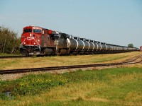 CP 615 accelerates out of Wynyard, Sk after making a crew change. 