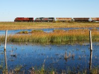 Far from home KCS 3914 helps pull CP 299 along CP's Sutherland Sub towards Saskatoon, SK.