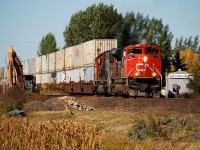 A CN Eastbound hammers over the diamond with CP's Lanigan Sub. 
