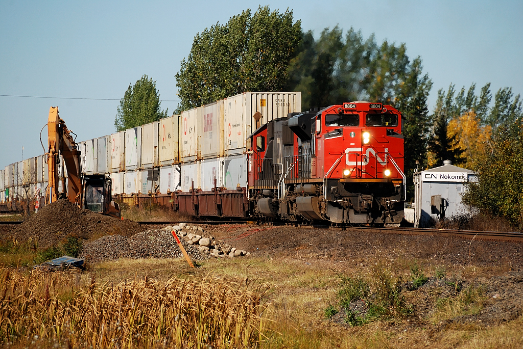 A CN Eastbound hammers over the diamond with CP's Lanigan Sub.