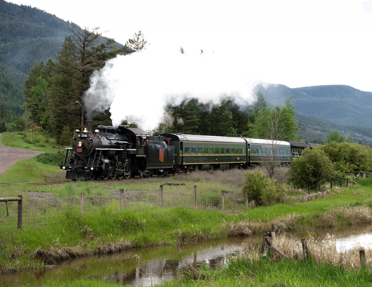 Kamloops Heritage Railway's ex CN 2-8-0 2141 with a Campbell Creek(Near Kamloops) to Armstrong BC excursion
Rolls along the Salmon River just west of the Village of Falkland on Kelowna Pacific Railwa's ex Canadian National Okanagan branch.