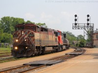 A dirty BCOL 4617 slowly leads 331 by Brantford.  They were hot on the tail of 385 so they were going quite slow by the platform due to having poor signals.