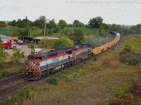 A pair of BCOL units leads CN 331 by Garden Ave on the outskirts of Brantford.  When I knew that the BCOL's were coming back on 331 this shot was the one I had in mind.  A chase to Paris was out of the question due to class at 1pm so this was my only glimpse at this duo. Unfortunately the sun didn't cooperate right when I needed it.  Nonetheless I am happy to have shot these!