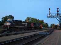 After making their 33 car set off, CN 332's power pauses in the yard at Brantford while the conductor throws a switch to allow them to make a 3 car pick up.  CN 5687 and NS 9911 where the power for 332.