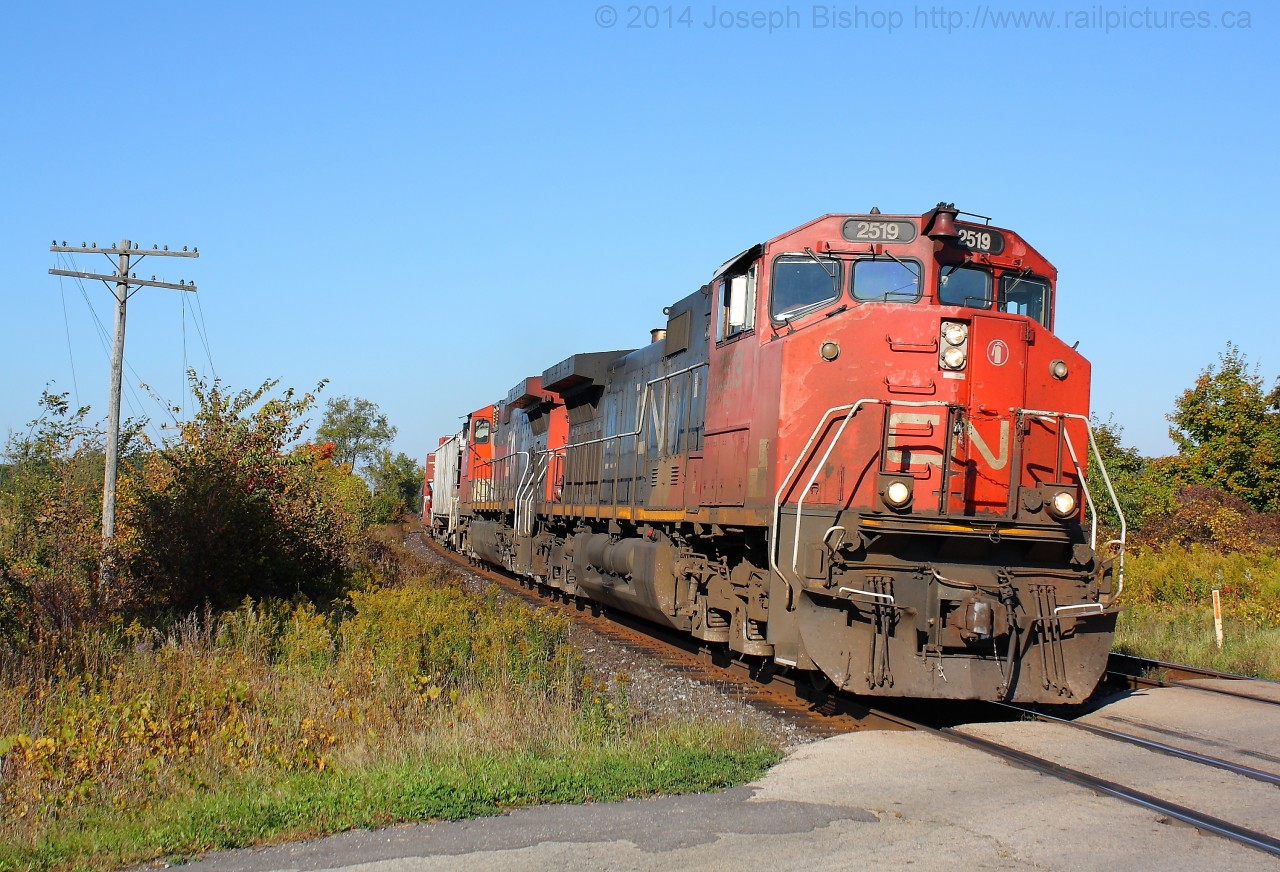 CN 435 blasts by Powerline Road West just outside of Brantford with CN 2519 on the point.  They will soon arrive in Brantford to complete their set off and pick up.
