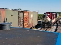 Home time ! The 10:00 Woodstock Job is just about done for the day and is seen pulling past the shop track switch before backing in to park for the night.