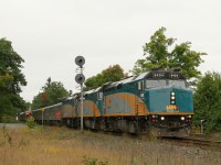 Was returning from an overnight trip to Parry Sound, ON, when we stopped near MacTier ON on a heavy overcast day for a southbound train.  We had expected it to be a freight but snapped a late running VIA #2 at Dock Siding N, MP 130.9, Bala Sub. seen at 13:14pm.   
