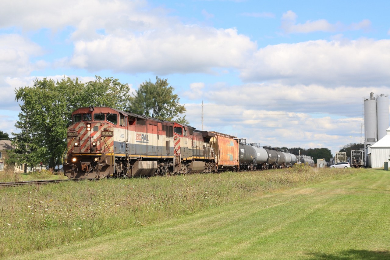 CN train 331 has a pair of former BC Rail GEs in charge as they are seen charging through Princeton after making a lift at Paris.