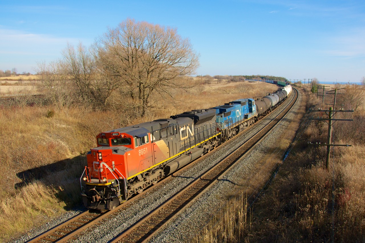 CN 8951 leads a westbound through Lovekin curve on a crisp fall day.