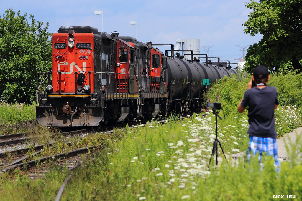 This day's CN 541 was a little more interesting than the other 541s Max and I have caught. Long hood forward leaders make everything a little more interesting, right? This is one tight spot, thats for sure. So instead of trying to somehow not get Max into my shot, I included him in the composition!