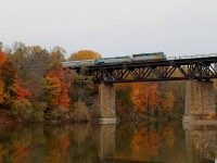 VIAs 6412 and 906 head east over Paris viaduct crossing the Grand River.