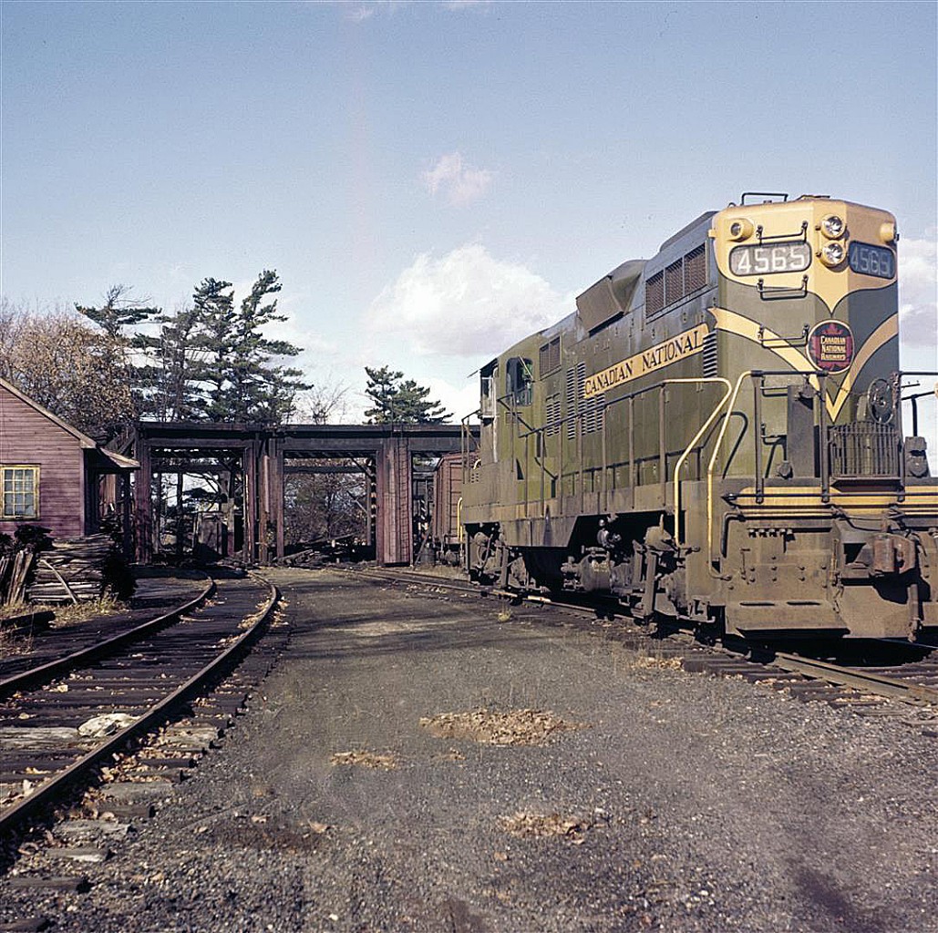 The late Del Rosamond photographed the final days of steam as well as the introduction of diesels in Ontario.  GP9 #4565 is shown in front of the burnt out three-stall engine shed in Pembroke, circa 1959.  My internet research shows this locomotive was built in November 1957, serial number A1301.  It was rebuilt as EMD GP9RM, #7231, in 1986.