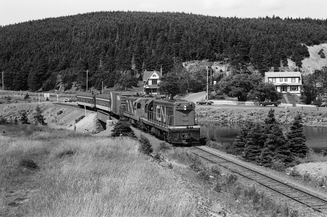 A special place – The Rock - 


….A photograph is worth many words....and for this unique place many words will not be enough...


Terra Transport  #232 - Tuesday, Thursday, Saturday - Carbonear to St.John's 
 powered by GMD G8's TT #805  -  TT #800. 


Clarke's Beach, Newfoundland


August 7, 1982 negative by S.Danko


...no place like it.....


Kenneth Pieroway has compiled a series of historic photographs and captured the Spirit of Newfoundland's branchlines in a publication: 


'RAILS AROUND THE ROCK - A Then & Now Celebration of the Newfoundland Branchlines' by Kenneth G. Pieroway, published by Creative Book Publishing of St. John's, Newfoundland. 


More Terra Transport:


  Terra Transport #232   


    T T #206   


    power for #204  


    TT #927  


   TT #929  


sdfourty.