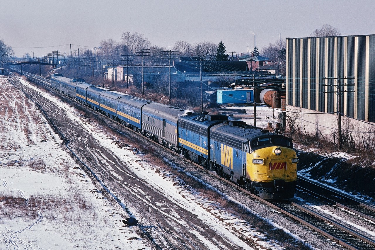 You are seeing triple


A Kodachrome with three trains


 ( at one time Via was quite creative ! )


Via #44


Via #54


Via #2


Approach CN Scarboro Junction – also now known as GO Scarborough –  long before a  Metrolinx


What's interesting:


The equipment pictured in this Kodachrome – at the time this positive was exposed ( 1983 ) – was  28 to 29 years old, mostly  built by GMD / Budd / CCF (Canadian Car & Foundry - Montreal)  circa 1954 – 1955. Do consider, when you view this, the LRC equipment  built by Bombardier circa 1981 – 1984 ( Via 3300 and 3400 series coaches, many since re-furbished ) that comprise the bulk of the Via  inter-city equipment  right now and for the foreseeable future are today OLDER than ALL the equipment pictured here !


From the Kennedy Ave overpass, a February 13, 1983 Kodachrome by S.Danko.


More Kingston Subdivision


  FPA's !   


  more FPA's !   


sdfourty.