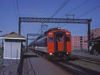 Some passengers are ready for a quick getaway as CN train #913 approaches its stop at Val Royal. 