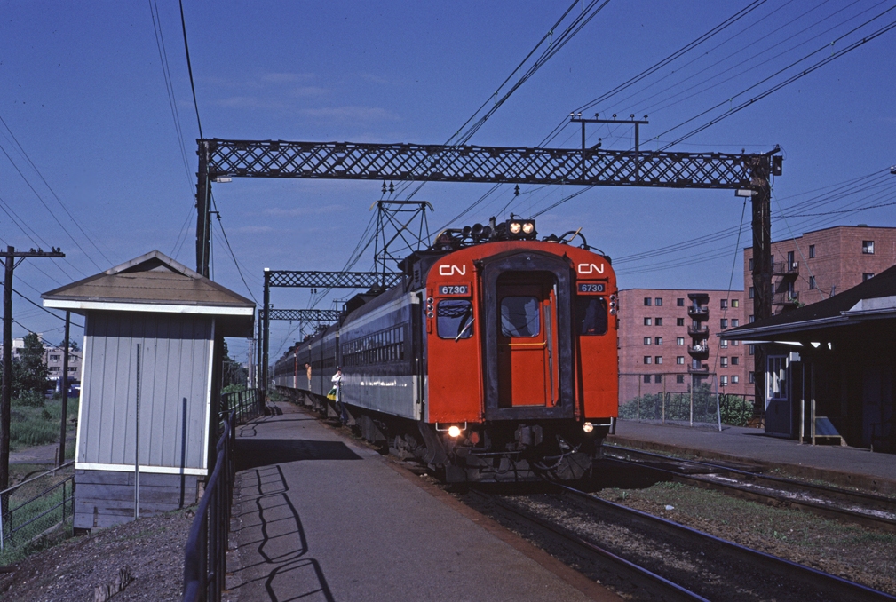 Some passengers are ready for a quick getaway as CN train #913 approaches its stop at Val Royal.