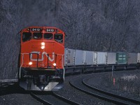 CN 9410 leads #239, westbound Laser past the old station site at Dundas.