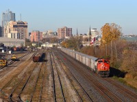 Doing almost the full mile-a-minute, CN 144 flies past London East on the north track with a relatively short train. Already well behind schedule, the train would encounter further delays near Woodstock after developing mechanical issues with the locomotive. 