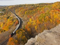 The colours of fall are starting to strut their stuff locally, and fiery scenes are kicking into high gear it's the middle of October and it is at it's peak, CN 5441 makes it's way down through the escarpment and down the hill on this cool fall Sunday morning. 