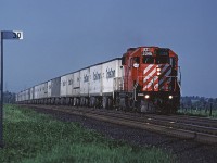 CP Rail Toronto - Detroit Roadrailer train #529 comes up out of the Hornby dip as it passes Mile 30, approaching Milton, ON.