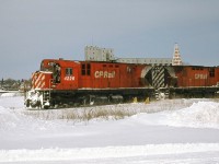 CP 4226 and 4246 at "the end of the line" - Owen Sound ON, the northernmost part of Canadian Pacific's Owen Sound Sub line from Streetsville to Owen Sound. MLW C424's were common road power on the Owen Sound Sub, Orangeville Sub and neighbouring lines, having been converted from DRF (Diesel Road Freight) or DRS (Diesel Road Switcher) units with the addition of rear lighting, numberboards, pilots. Note the reversed radiator grill section on trailing 4246, resulting in an odd-looking multimark.<br><br>The last train out of Owen Sound was on October 31st 1995, and CP abandoned and removed the entire line between Owen Sound and Orangeville not too long after (this section was originally built by the Toronto, Grey & Bruce). When the remaining section from Orangeville to Streetsville (originally built by the Credit Railway) was threatened, the line was purchased from the CPR by the town of Orangeville for continued operation in 2000.