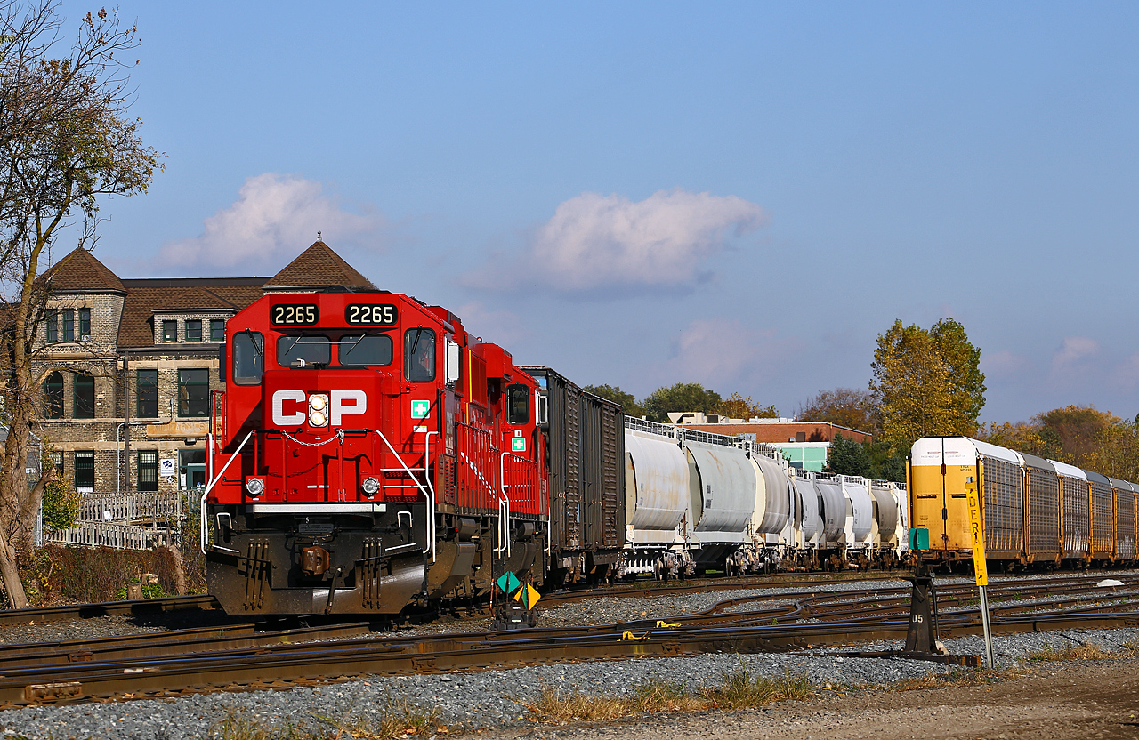 Returning to the yard at an odd time, the London Pickup makes a headroom move at the west end of Quebec street yard with a pair of shiny GP20-ECO's. Normally nocturnal, its' departure time from London seems to be rather variable these days.