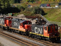 L55431 09's power (CN 1412 - CN 7075 - CN 7304) backing into Aldershot after arriving from Oakville and cuting away from it's train....where else can you get a consist like this but CN ?? :)
