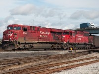 CP ES44AC 8743 leads a coal train with CP SD30C-ECO 5002 into Roberts Bank in Delta, BC.