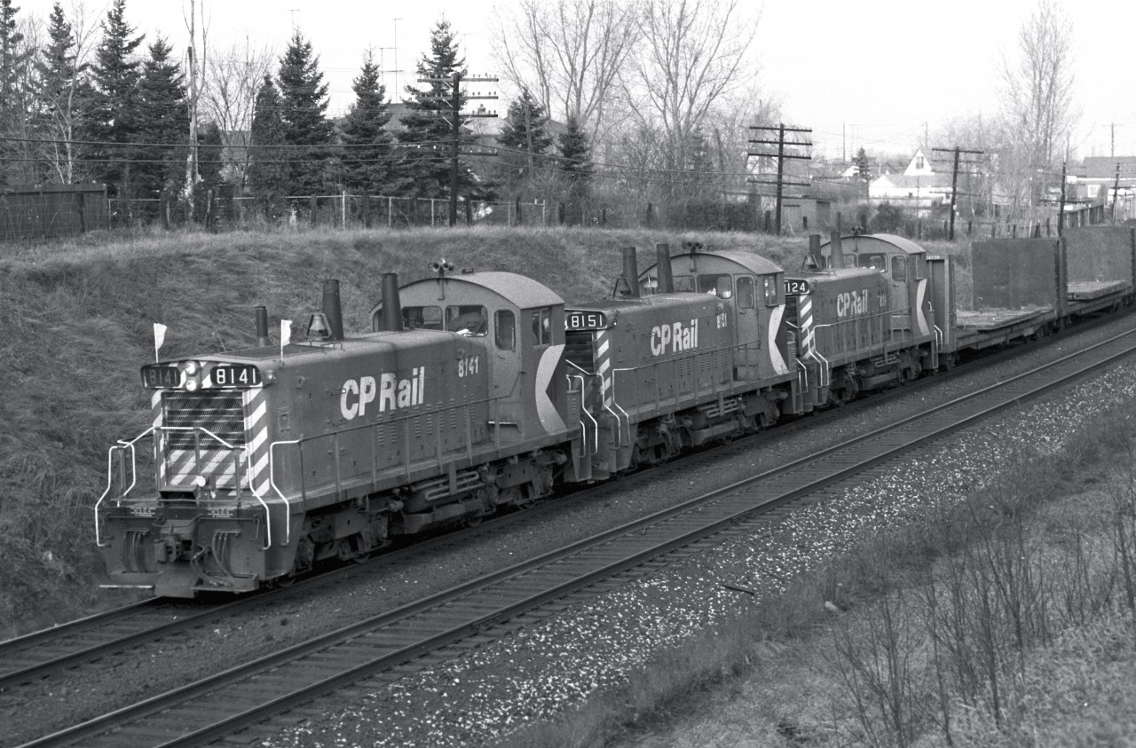 Here is where it all began... at the back of my yard!  I spent many hours here watching the trains work their way from Toronto up the hill towards the Agincourt Yard.  Over the years, I got to know the faces of many of the engineers.  They would give me a friendly blast when they saw me waving.  Sometimes I would be in my bedroom and I'd hear a couple of short bursts on the horn... the engineers like Mac Allen just sayin' hello.  It has been many years since I've lived there, but I sometimes wonder if even today there are other young teenage boys watching and photographing the trains as they go by.