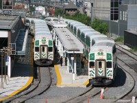 Sister GO cab cars 236 and 237, both built by UTDC in the late 80's and refurbished not too long ago, wait at outside platforms 26 and 27 on the south end of Union Station. 237 heads a 10-car train 809 for Barrie, while 236 heads 12 car Milton line train 159.