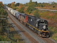 The crew enjoys the luxuries afforded by the pride of the fleet as they lug 376's train up the grade towards Newtonville. The previous week IC 1005 was acting up as the DPU on a 305, but there were no apparent issues today. CN 2402 trails and CN 2101 is todays DPU. 1241hrs.