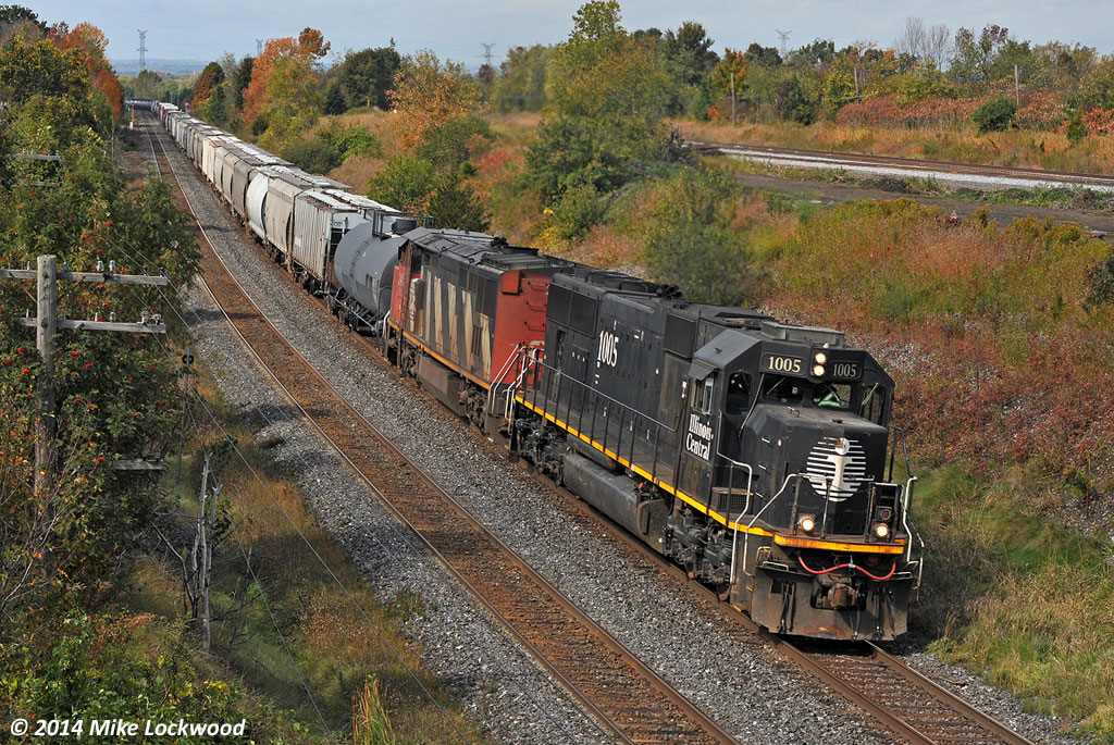 The crew enjoys the luxuries afforded by the pride of the fleet as they lug 376's train up the grade towards Newtonville. The previous week IC 1005 was acting up as the DPU on a 305, but there were no apparent issues today. CN 2402 trails and CN 2101 is todays DPU. 1241hrs.