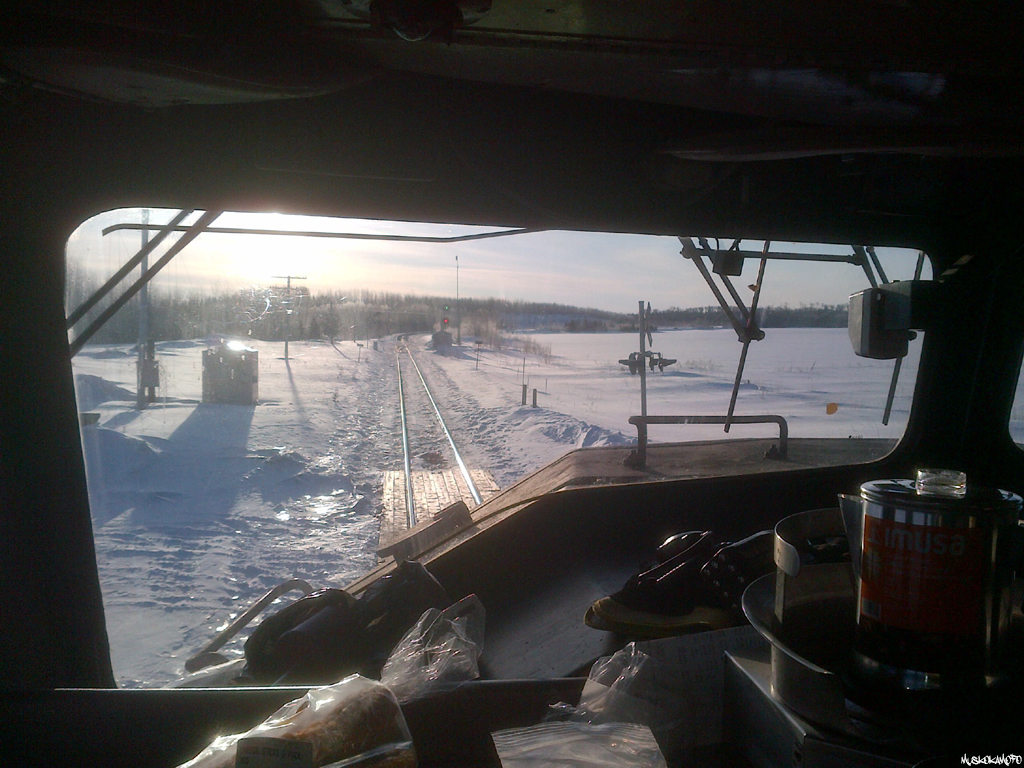 "CN 114 has a clear signal on the home, Arms". Looks like tea is on, and I've got breakfast underway on my desk during a beautiful winter sunrise in Northern Ontario. Taken by a railway employee while wearing all required PPE.