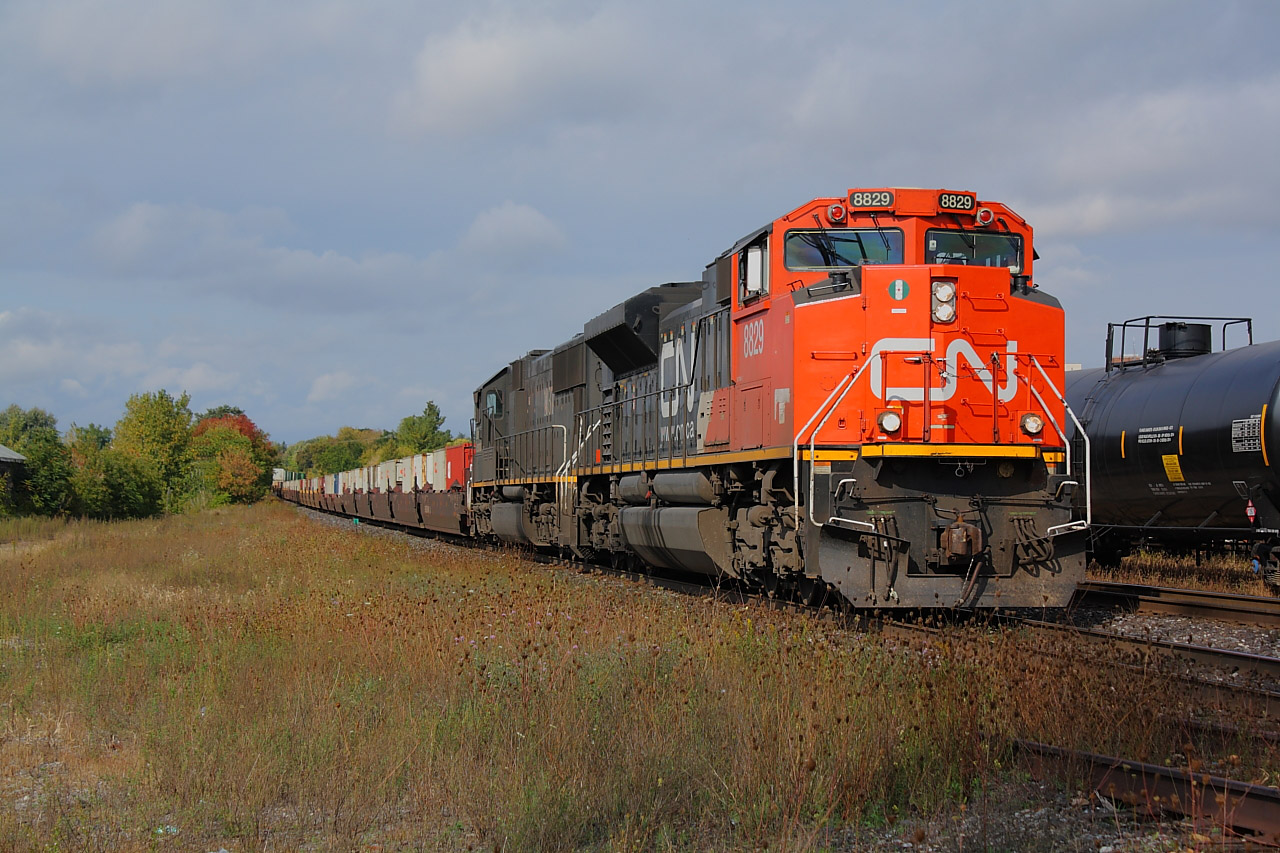 CN 148 cruises through Brantford on the South track with CN 8829 and IC 1037 providing the horsepower.  On a day that was mostly gloomy I lucked out getting some awesome sunlight for this train.