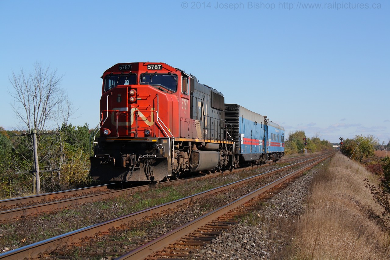 CN test train O482 approaches Powerline Road West in Brantford with CN 5787 and two track geometry cars on a sunny but cool October morning.