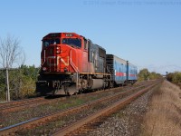 CN test train O482 approaches Powerline Road West in Brantford with CN 5787 and two track geometry cars on a sunny but cool October morning.