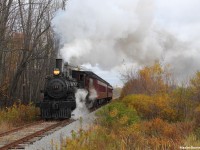 Canadian Pacific locomotive 136, a steam 4-4-0 throttles up the grade with 2 restored 1920's era passenger cars in tow. #136 helped to construct the transcontinental railroad, and was built in Montreal in 1883. 