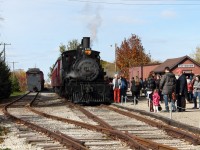 The ex - Canadian Pacific 136, now belonging to the South Simcoe Heritage Railway, sits at the Tottenham station awaiting its next run with 2 1920's era passenger cars in tow. To the left, we have some more railway equipment. For a fun fact, this is the oldest operating heritage railway in Ontario (operating since 1993) and this engine is the oldest operating one in Canada (built in Montreal in 1883).